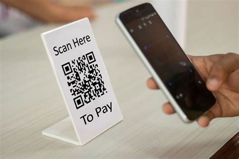 Scan to Pay via QR Code .